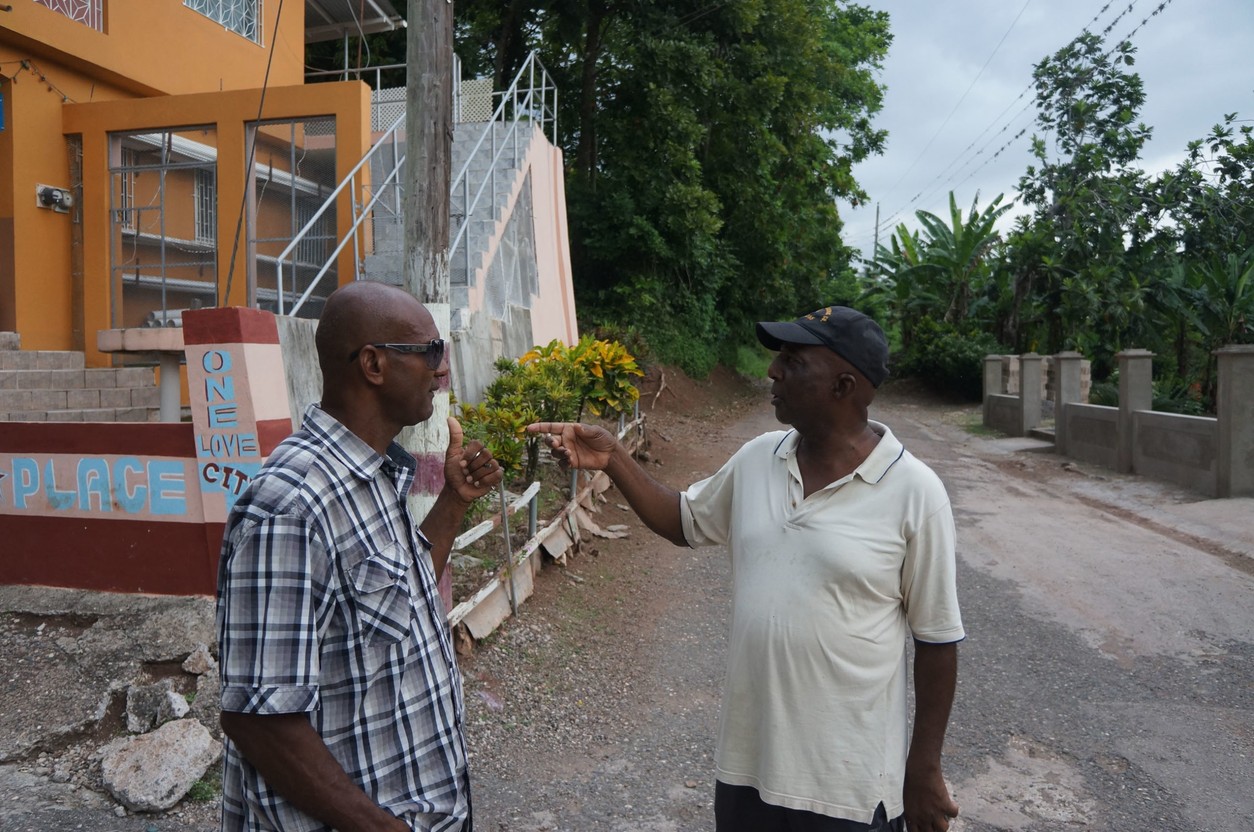 Dennis on left talking with Eric, local resident. He did not remember any Perkins, but recalled surnames Dunkley and Brennan, surnames of the some of the female lines